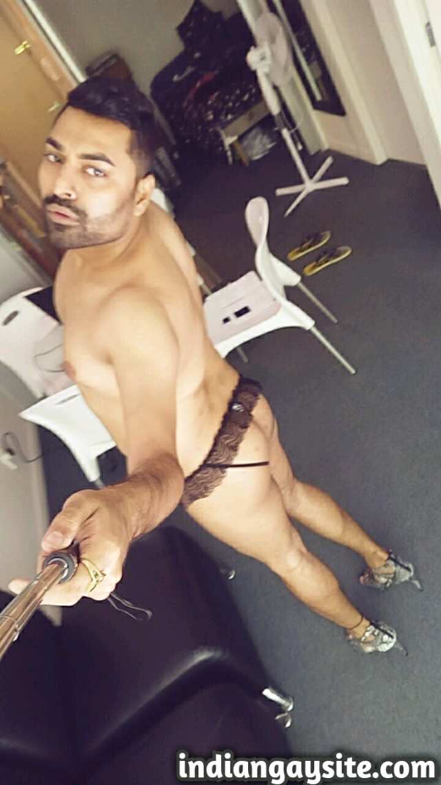 Indian Gay Porn: Sexy NRI hunk exposing his hot body in a skimpy thong and heels