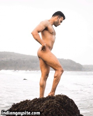 Naked Muscular Hunk Posing & Flexing by the Sea