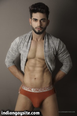 Sexy Naked Hunk Posing in Briefs for Ad