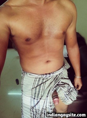 Naked Indian Hunk Shows Dick Peeking Out of Lungi