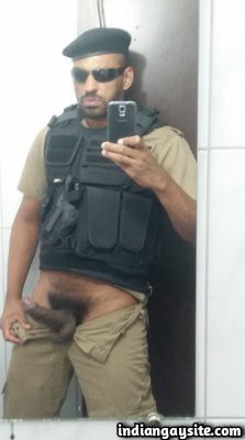 Nude army hunk teasing big hard uncut cock