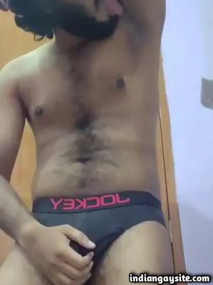 Hairy gay stripper licking own naked body