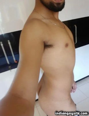Nude Indian hunk shows hard cock & smooth ass