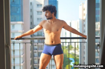 Horny muscular hunk teasing sexy body in undies