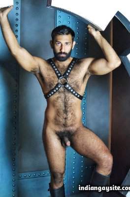 Naked hairy bear in bondage gay photoshoot