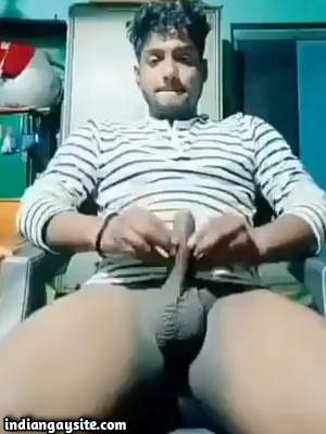Jerking horny man showing off boner on cam
