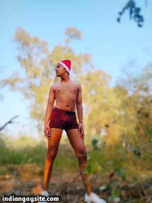 Naked gay santa teasing his hot body outdoors