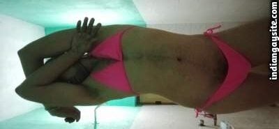 Naked crossdresser man shows body in bra and panties