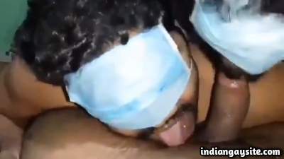 Two gay suckers on one big uncut Indian cock