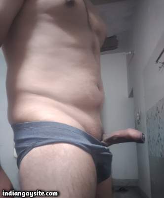Big dick hunk teasing his hot boner in stripping pics