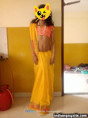 Crossdressing Indian man teasing in a saree in pics