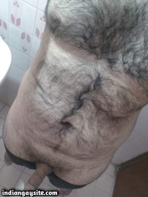 Gay hairy bear man teasing sexy chest in nude pics