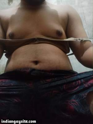 Horny crossdresser boy teasing nipples in sexy pics
