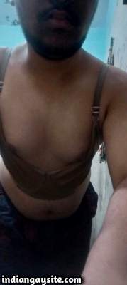 Horny crossdresser boy teasing nipples in sexy pics