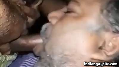 Horny old daddy sucking the big hard dick of a stranger