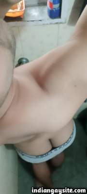 Indian gay boy teasing his sexy body as he strips in pics