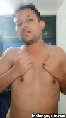 Indian gay boy teasing his sexy body as he strips in pics
