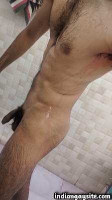 Slutty hot man being all wet and naked in shower pics