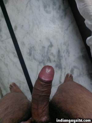 Delhi top man showing off his big hard uncut cock in pics