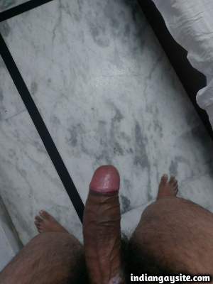 Horny Delhi man teasing his big uncut boner in pics