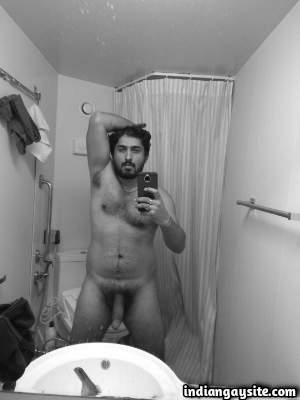 Naked hot dude teasing his big hard boner in pics