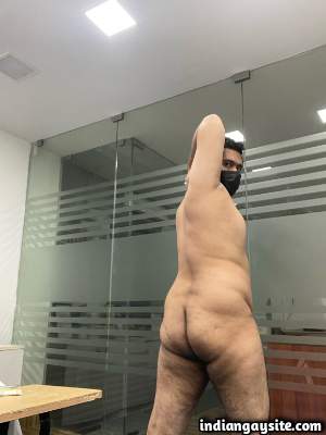 Horny office boy teasing his hot nude body in pics