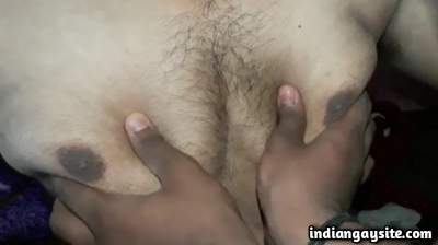 Man boobs squeezing video of a horny Indian gay boy