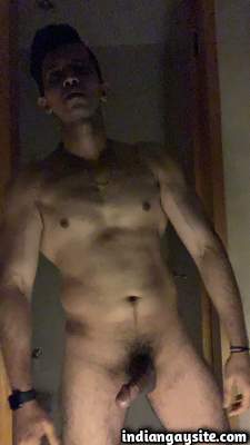 Posing naked man teases muscular body and cock in pics