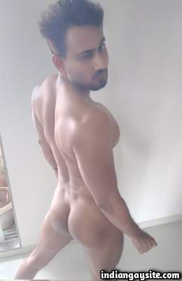 Muscular hunky man teasing his round ass in pics