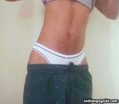 Horny underwear boy teasing his big cock in pics