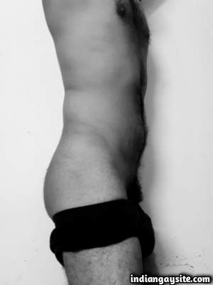 Gay porn pics of a horny man in black and white nudes
