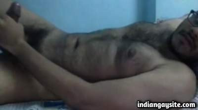 Hairy sexy man jerking his big fat dick on cam